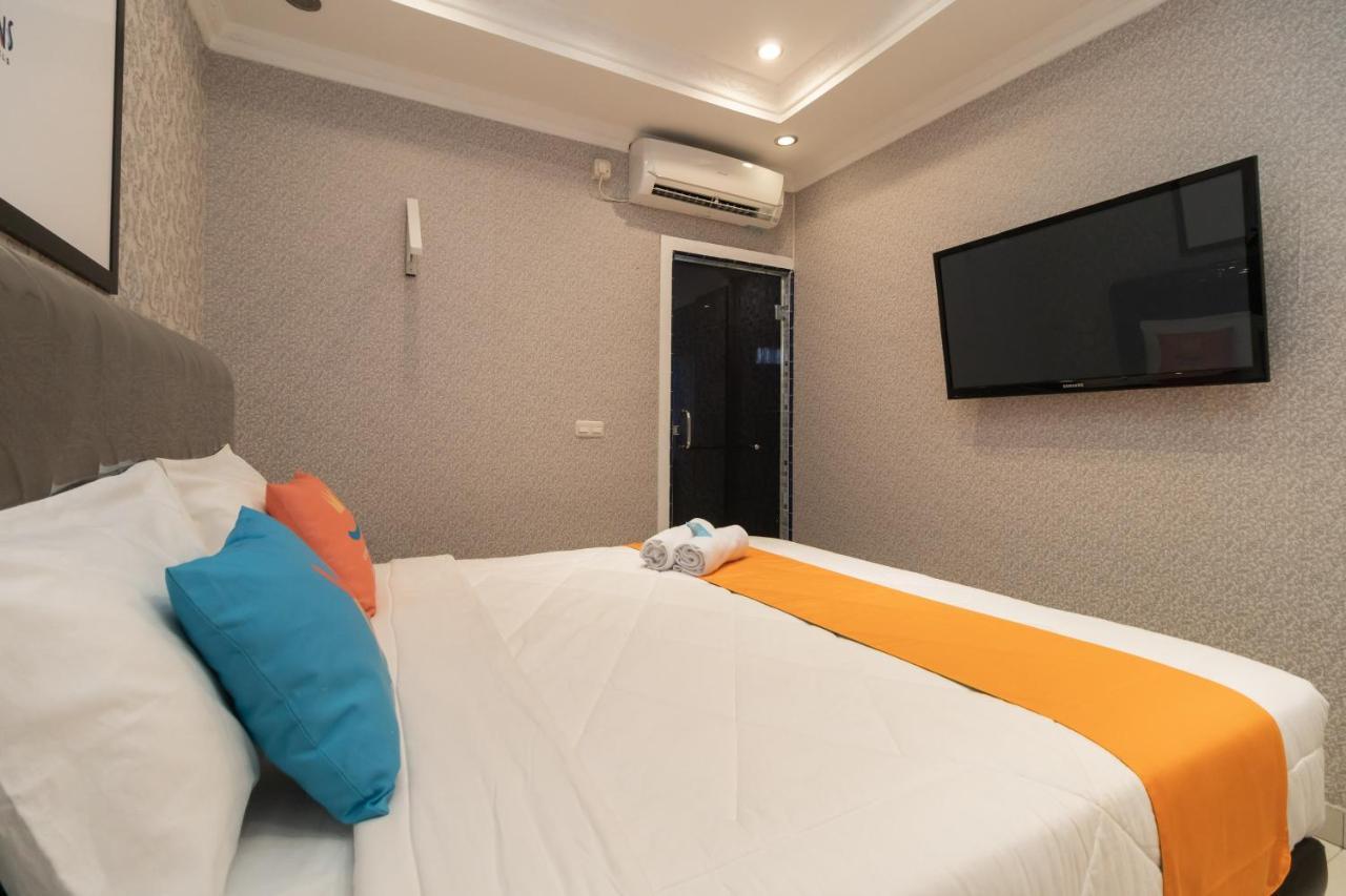 Sans Hotel Beauty Palembang Esterno foto