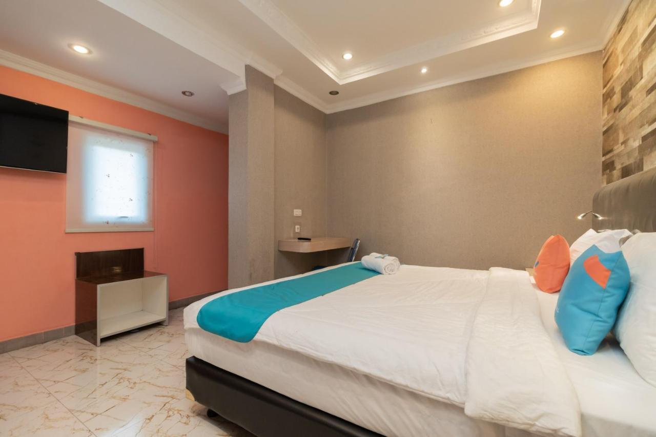 Sans Hotel Beauty Palembang Esterno foto