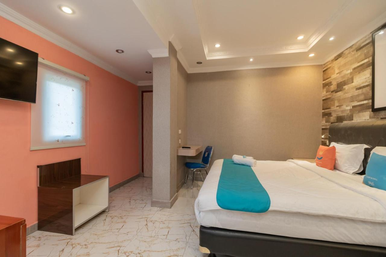 Sans Hotel Beauty Palembang Esterno foto